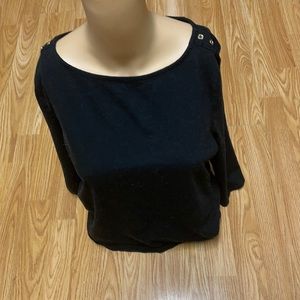 A.N.D. Size Large black oval neck pull on t-shirt.